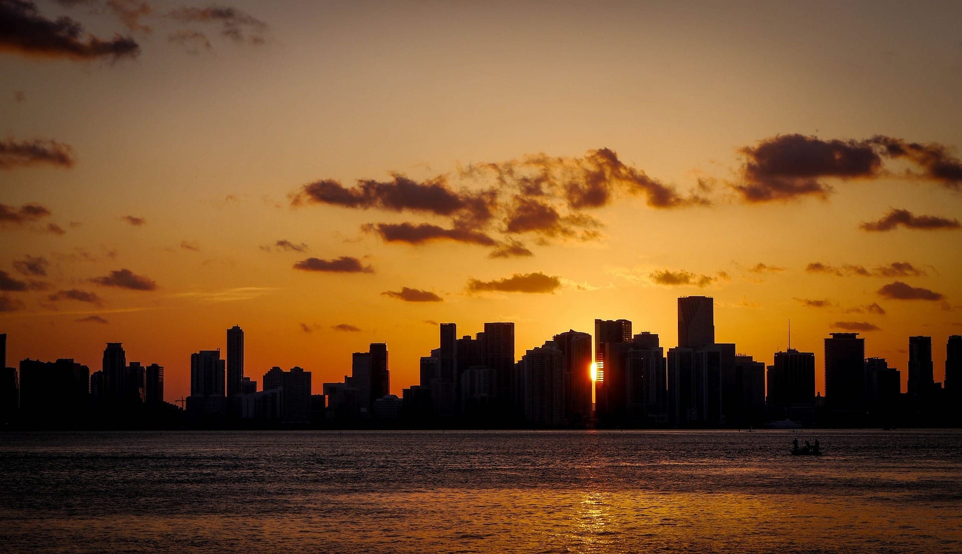 Miami skyline at sunset over Biscayne Bay — private sunset cruise view