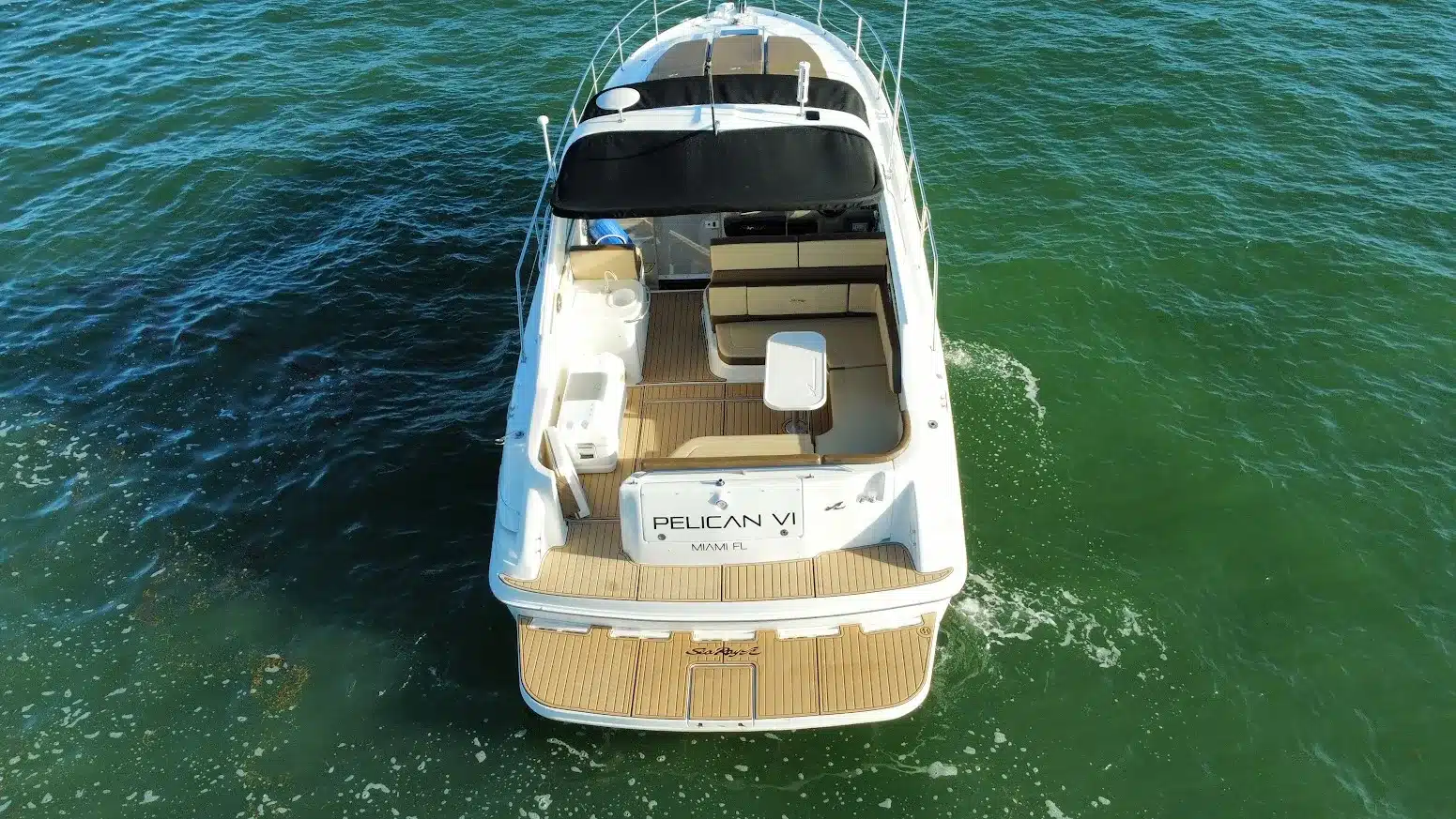 Aerial view of the full 40 Sea Ray sport yacht hull on Biscayne Bay — Miami private charter
