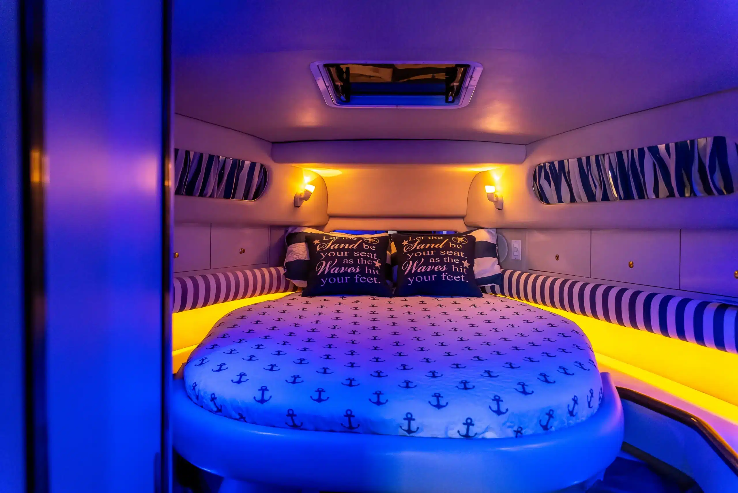 Guest stateroom bedroom on the 48 Sundancer sport yacht — Miami private charter
