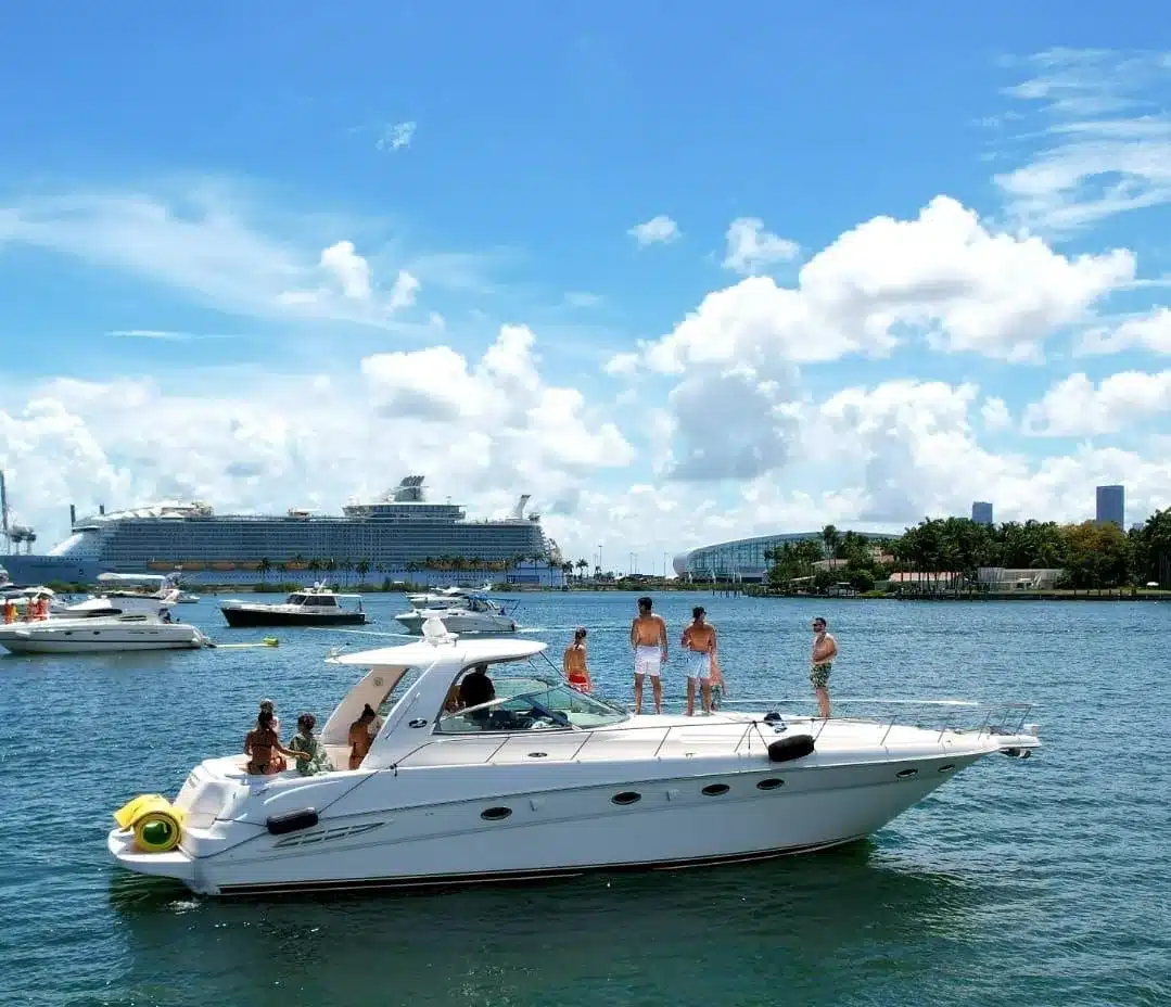 48 Sundancer sport yacht side profile on Miami water — private charter