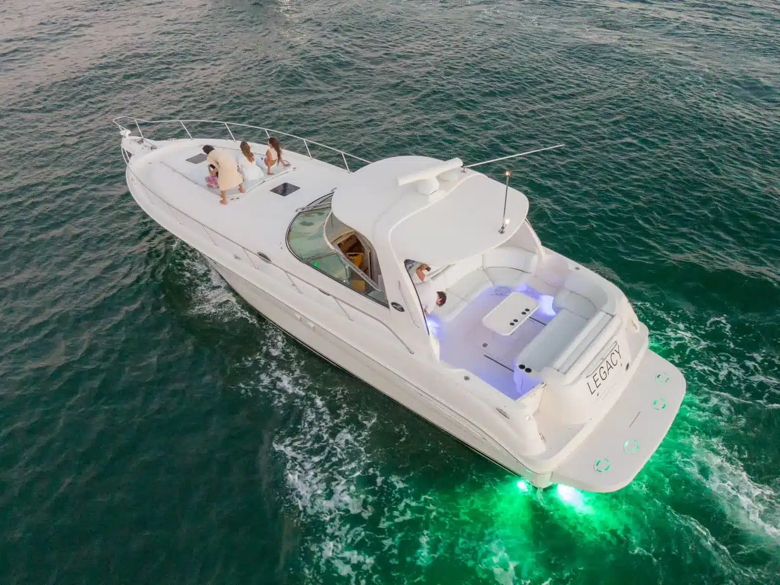 48 Sea Ray Sundancer sport yacht bow sunpad facing Biscayne Bay, Miami — private charter