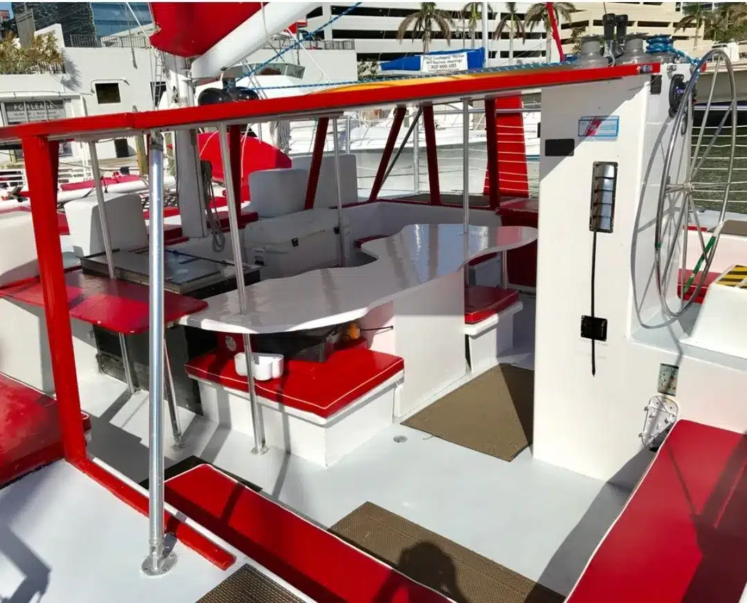 Rear deck bar and dining table on MTWA catamaran Mariah — Miami crewed charter entertaining