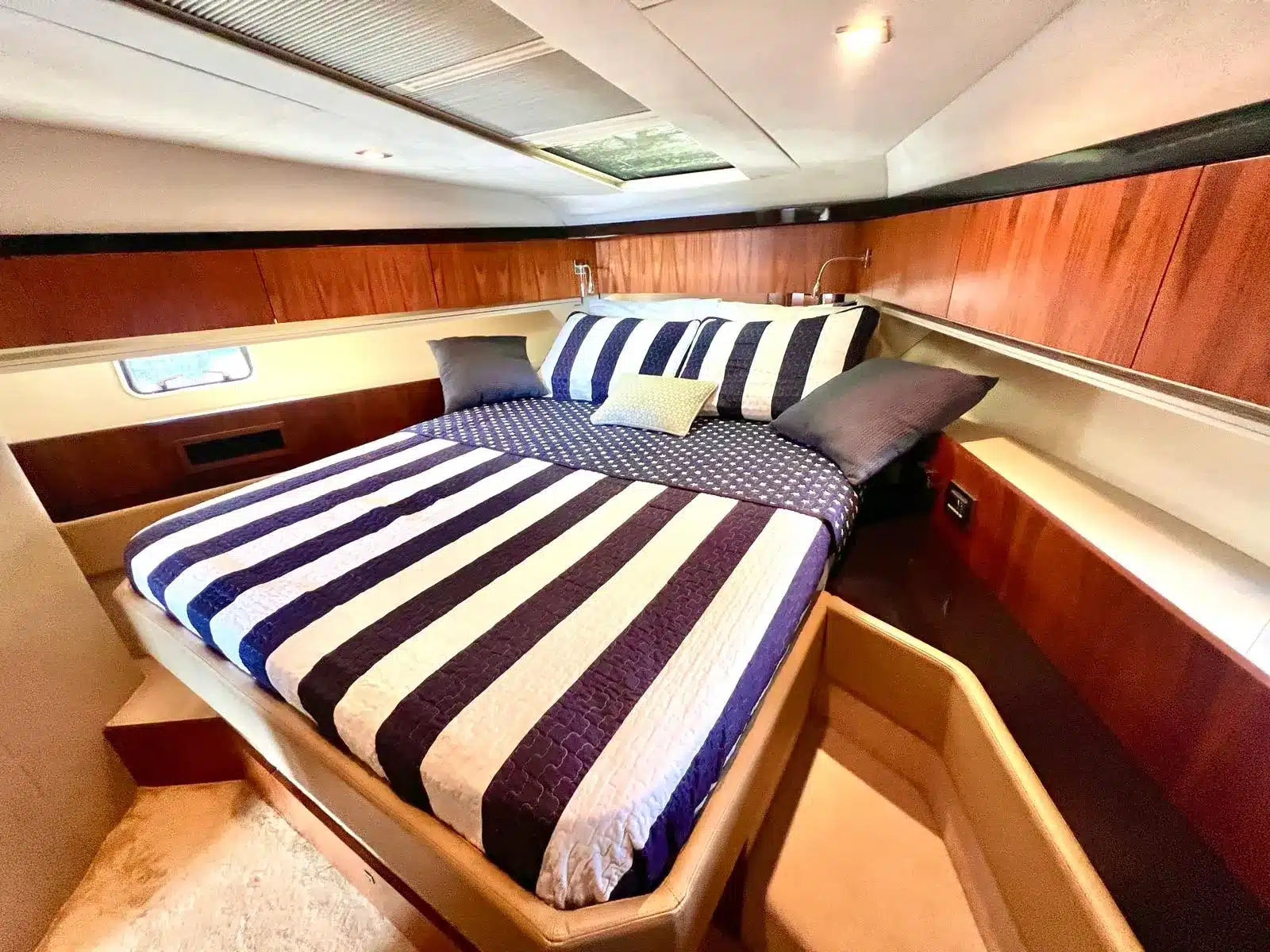 Guest stateroom bedroom on the 46 Flybridge sport yacht — Miami private charter