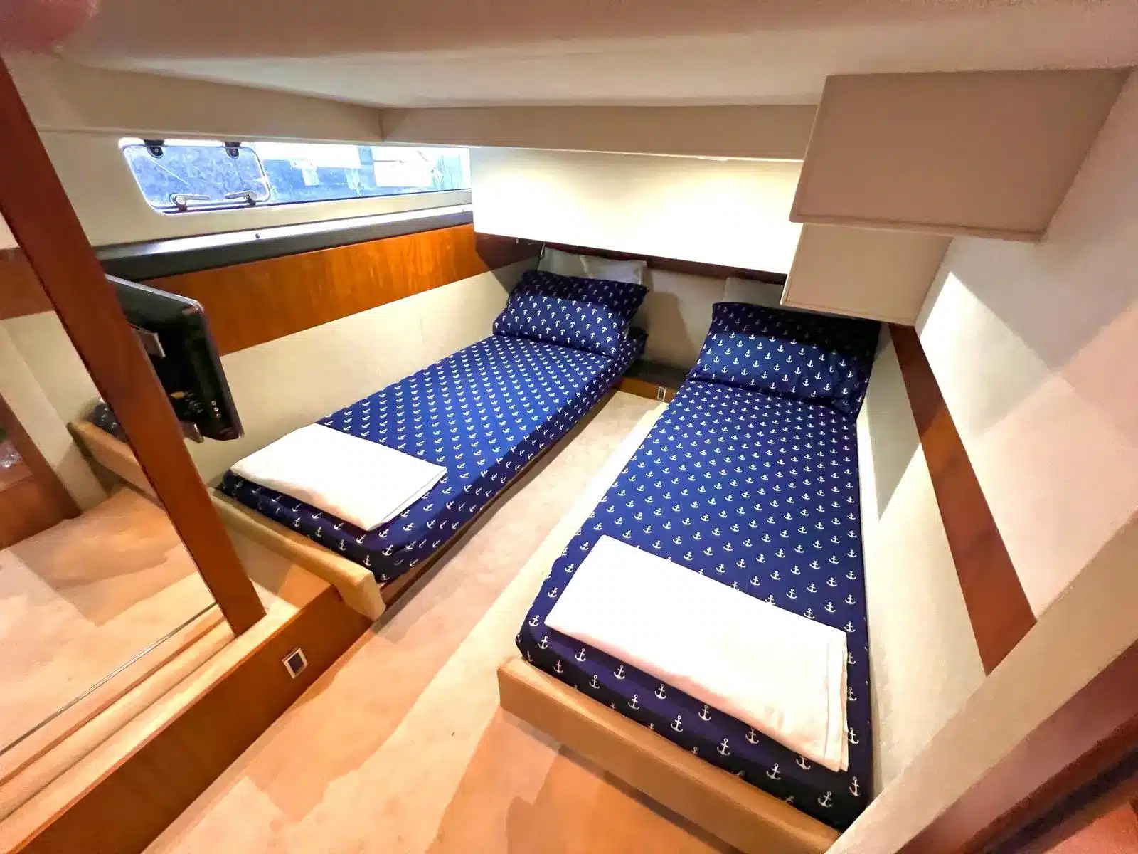 Salon interior on the 46 Flybridge sport yacht — air-conditioned main deck, Miami charter