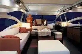 Interior salon and living area on the 62 Azimut — seating, Miami luxury charter