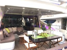 Dining area on the 86 Azimut luxury yacht — formal entertaining with Miami skyline views