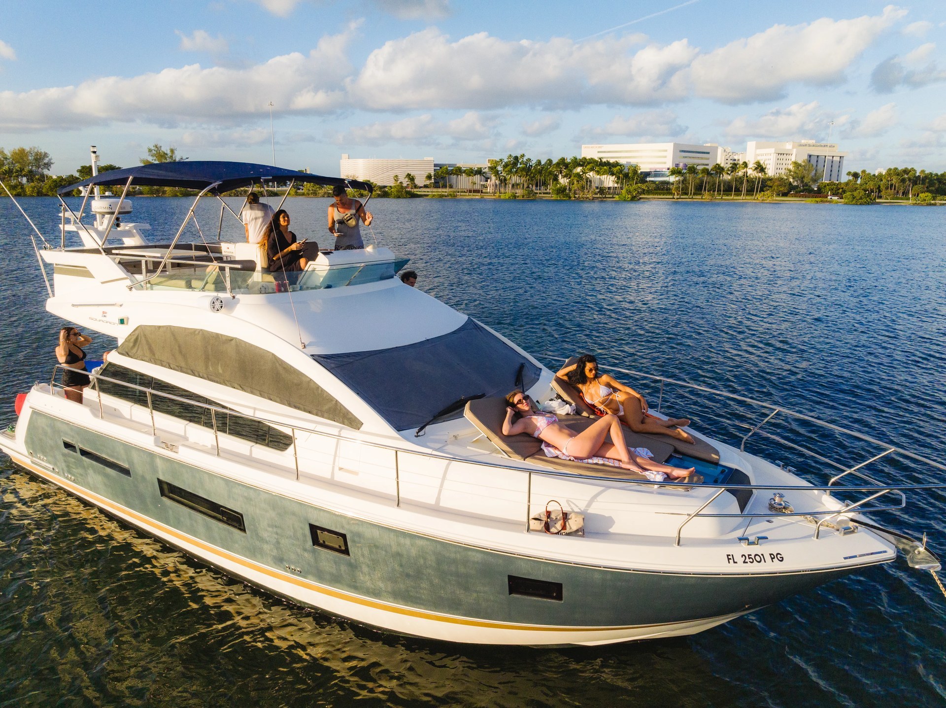 46 Flybridge Sport Yacht Miami — elevated helm, up to 13 guests